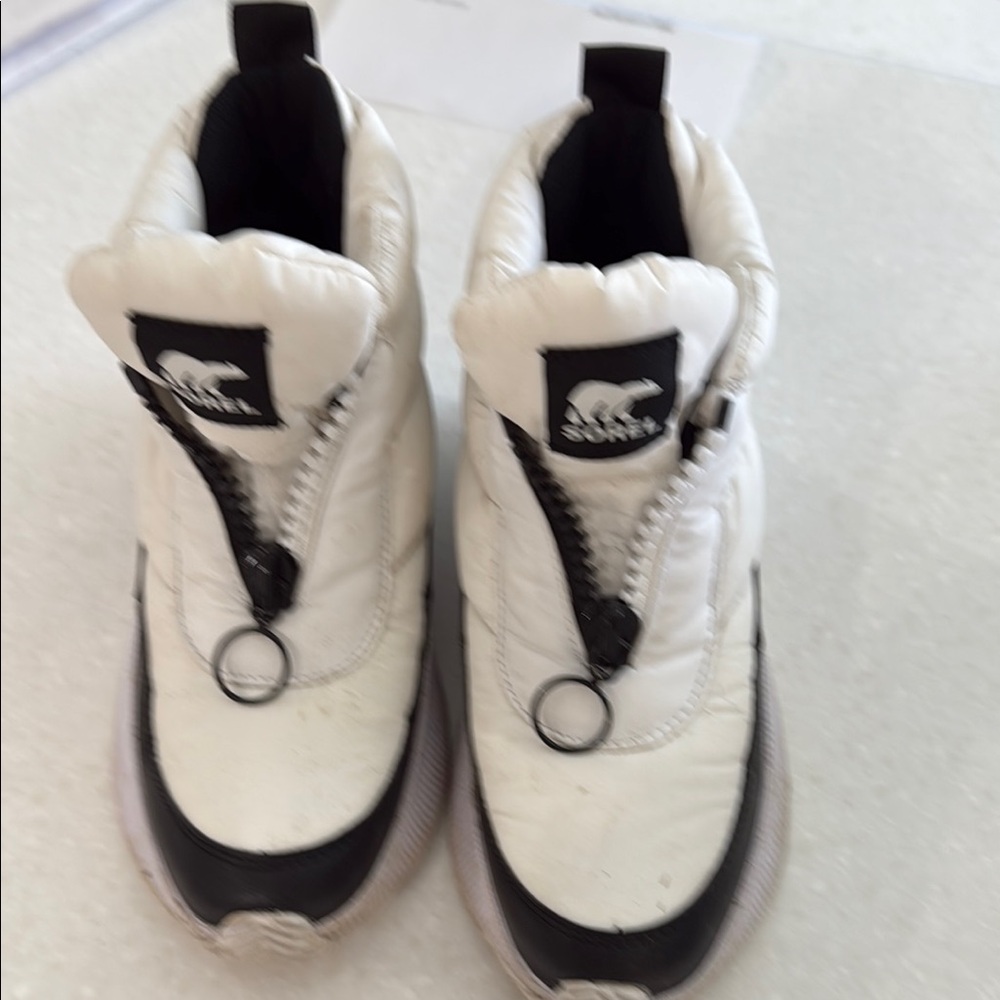 White and Black High-Top Sneakers